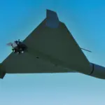 Понівечений торговельний комплекс у Кривому Розі з пожежею та пошкодженнями після удару безпілотниками